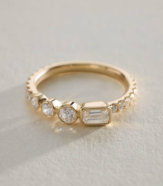 bezel diamond ring in yellow gold